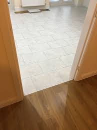 No Need For Unsightly Door Bars Karndean Tiles And Planks Can Be Installed Like This To Flow Perfectly With No Difference In Levels Door Bar Flooring Plank