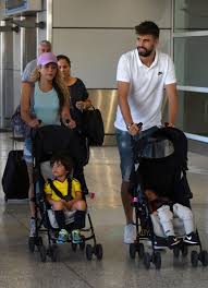 'we are happy to announce the birth of milan piqué mebarak, son of shakira mebarak and gerard piqué, born january 22nd at 9:36pm, in barcelona, spain. Shakira And Gerard Pique Arrive In Miami With Their Boys