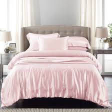 Silk bedding is touted for its smooth texture that not only feels incredibly dreamy, but also reduces the friction on your skin and hair. Light Pink Silk Bed Linen From The Finest Mulberry Bedroom Set Atmosphere Ideas Glitter Fabric Background Taffeta Over Ribbon White Apppie Org