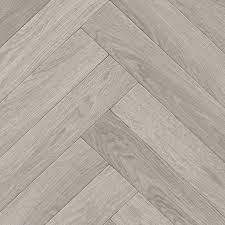 This dark stone effect floor, inspired by stone and earth minerals, combines style with durability. Bathroom Vinyl Flooring Tapi Carpets Floors