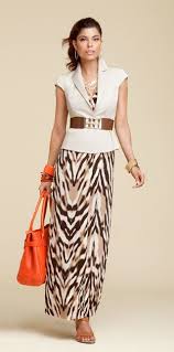 Day A Bold Animal Print Maxi Is Perfectly Professional With A Sleek Jacket And Striking Orange And Gol Business Casual Attire Business Dresses Modest Fashion