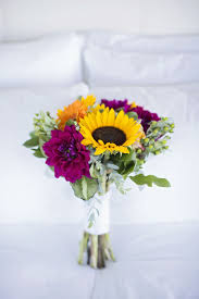 Perfect for a country wedding! Magenta Dahlia Sunflower And Gerbera Daisy Bridal Bouquet Dahlia Wedding Bouquets Dahlias Wedding Sunflower Wedding