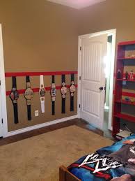 Hank S Wwe Room Makeover Adhered Velcro To The Wall For The Belts To Attach To This Makes It Easy To Take Off And Wwe Bedroom Big Kids Room Wwe Bedroom Decor