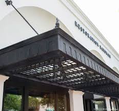 Ironwood Designs Photo Gallery Of Iron Marquees Kiosks And Other Specialty Metal Work Ironwood Design Hotel Entrance Metal Awning