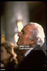 Time Warner Co-CEO Steve Ross listening intently to Four Freedoms FDR...  News Photo