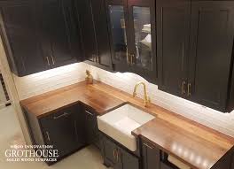walnut wood kitchen counter in granite