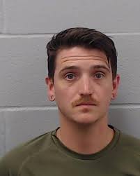 Borden, Jared Elliot was booked into the Hays County Jail