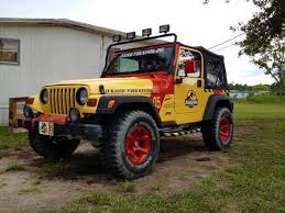 Yellow 2001 Jurassic Park Jeep Wrangler Tj Sport 4x4 L6 2 Jpg 600 450 Pixels Jurassic Park Jeep Jeep Wrangler Tj Jeep Wrangler