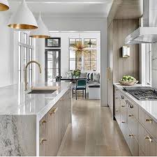 Kitchen Details Champagne Beige Cabinets Brass Hardware White Pendants And Marble Countertops Modern Kitchen Design Interior Design Kitchen Kitchen Interior