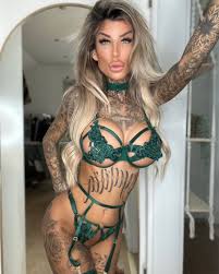 Yellow-haired amateur Jacky Inked poses in green lacy undies in a cute solo  - pornxxy.com