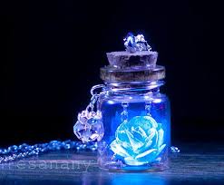 Black And Sky Blue Flowers The Glowing Rose Magical Glow Flower Vial Necklace Silver Etsy Dark Jewelry Vial Necklace Glowing Flowers