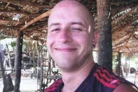 Biker fights for life after crash with car