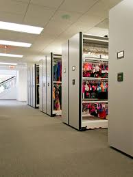 Retail Brand Gets Powered Up With High Density Mobile Storage In 2020 Storage Shelving Mobile Storage