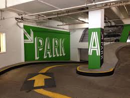 Pin By Emily Ashley Frost On Branding Wayfinding Parking Design Parking Lot Signage Wayfinding Signage Design
