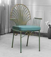 Sheffield wrought iron adjustable chaise lounge with cushions. Buy Kalvos Wrought Iron Chair With Cushion In Blue Golden Rustic Finish By Globally Indian Online Upholstered Armchairs Chairs Furniture Pepperfry Product