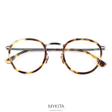 the mykita antti eyeglasses in shiny graphite cocoa sprinkles is constructed out of ultra lightweight stainless steel with acetate inserts for oculos de grau