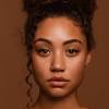 Black woman headshot white background. 1