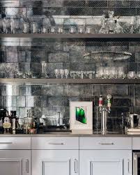 Pulled out my blow dryer and a spackle knife that was flat and could slide under the back of mirrors to be removed. Top 70 Best Home Wet Bar Ideas Cool Entertaining Space Designs Antique Mirror Backsplash Home Wet Bar Kitchen Mirror