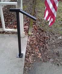 The base plate and heavy bottom tube are designed to take the extra stress of having only a single post. New Handrail Wrought Iron 1 2 Steps Steel Grab Rail Single Post Railing Unique Handrail Step Railing Porch Handrails