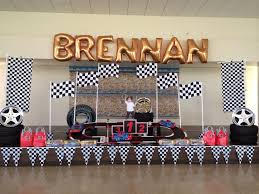 Transportation office, street signs, street lamps, car murals. Race Car Stage Backdrop Set Up Cars Theme Birthday Party Race Car Birthday Party Car Themed Parties