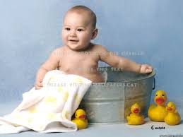 You can wash your newborn in a small baby bath. Tot Bathing With Baby Ducks Ducklings Cute