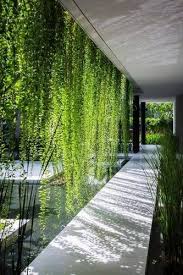 16 Landscaping Tips If You Don T Have A Front Yard Domino Outdoor Design Architecture Vertical Garden