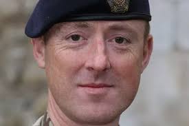 Queen's Gallantry Medal for hero who waded through effluent matter for  THREE HOURS checking for explosive booby traps
