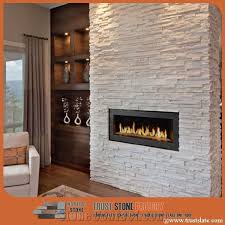 The fireplace stands out both with its design and its color which contrasts with the white walls and ceiling. Culture Stone Super Snow White Pure Quartzite Ledge Stone Fireplace Decoration Wall Cladding Stone Stacked Stone Veneer From China Stonecontact Com