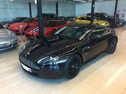 Image result for Marron Black 2017 Aston Martin