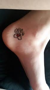 Paw Print Tattoo Designs Are Very Common Among Animal Lovers And Makes A Symbolic Gesture So Let Choose Best Print Tatto Pawprint Tattoo Tattoos Print Tattoos