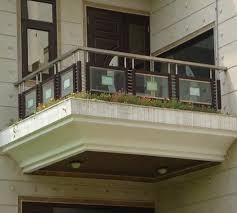 Because you can't paint vinyl porch railings, they may not blend well with some house designs. Front Railing Front Glass Railing Manufacturer From Delhi