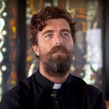 Surfing priest rescues swimmers from drowning — again