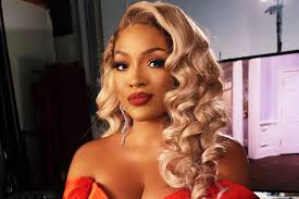 Drew Sidora Looks Radiant in an Amethyst Midi Dress That's Perfect for Fall