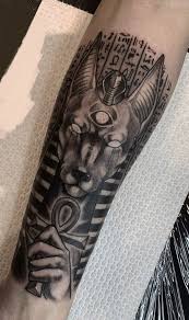 Dove tattoo designs usually symbolize peace. Anubis Tattoos Meanings Artists Tattoo Designs Ideas