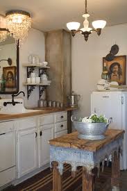 Rustic Shabby Chic Kitchen With Chandelier And Wood Island Eclectic Kitchen Rustic Kitchen Island Rustic Kitchen