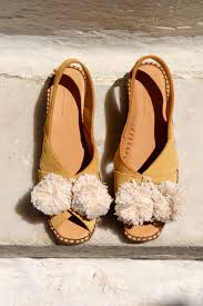 An online boutique with the most fascinating curation of fashion brands and hard to find designers in spain. Naguisa Leather Espadrilles With Pom Poms Mina S Closet