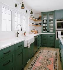 Glorious Dark Green Cabinets With Vintage Rug Perfect Style For A Modern Kitchen Green Kitchen Walls Interior Design Kitchen Green Kitchen Cabinets