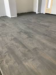 Sand And Finish Wood Flooring With A Gray Tone Stain Wood Floor Finishes Flooring Wood Finish