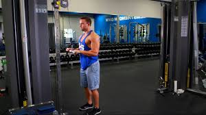 Attach a rope handle to the high pulley of a cable station. Straight Bar Tricep Extension Video Exercise Guide Tips