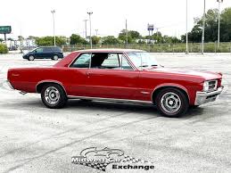 Image result for Grenadier Red 1964 GTO