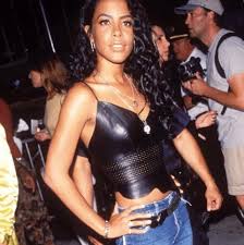 A denim outfit for the ages. A Look Back At Aaliyah S Best Style Moments Fashion Magazine