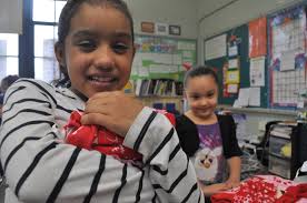Dorman Elementary School students in Springfield go bananas for Christmas  pajamas from Clerk of Courts Laura Gentile