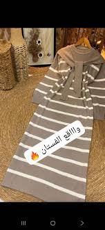 تكرررار* *موسم شتاء 2026* 🔥🔥🔥🔥🔥🔥🔥🔥 *مستمرررين معكن بالتريندات  وبأحلى موديلات* 🔥 *فستان الاناقة والاكابرية للصباياااا* 😍 🌹🌹 *فستان  مقلم مع لحشة قماش تريكو خيط اجنبي وليس وطني مكفوووووول*💯💯 *الالوان بالصور  مطابقة للواقع*