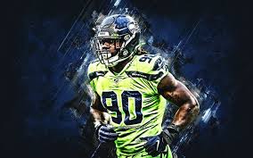 Download Wallpapers Jadeveon Clowney Seattle Seahawks Nfl American Football Portrait Blue Stone Background Usa Creative Art Besthqwallpapers Com In 2020 American Football Seattle Seahawks Football