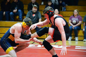 Knights advance four wrestlers to semifinals