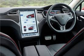 The interior upholstery looks classy and understated at the same time. Tesla Model S Will Borrow The Model 3 Interior Electric Hunter