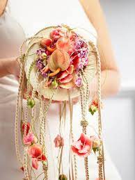 Floral bouquets may become a thing of the past for brides who love to make a statement or want to to walk down the aisle in style check out these 6**** amazing wedding bouquets that will last forever. Designed By Manfred Hoffmann Unique Bridal Bouquets Bridal Bouquet Modern Bridal Bouquets