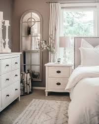 Studded Bed Upholstery Headboard White Bed Table And Dresser Glass Mirror White Bed Covers Bedroom Furniture Placement Home Decor Bedroom Bedroom Interior