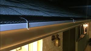 Attach lights along your gutters or roof with plastic clips made for the job. Gutter Hooks For Christmas Lights Wire Bending Jig Youtube