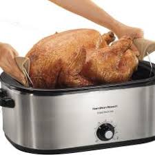 Place turkey in the roaster, breast side up. How Long To Cook Turkey In Electric Roaster Thanksgiving How Tos Step By Step Turkey Desserts Side Dishes Food Network Food Network